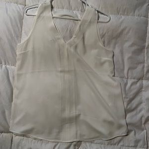 White sleeveless blouse